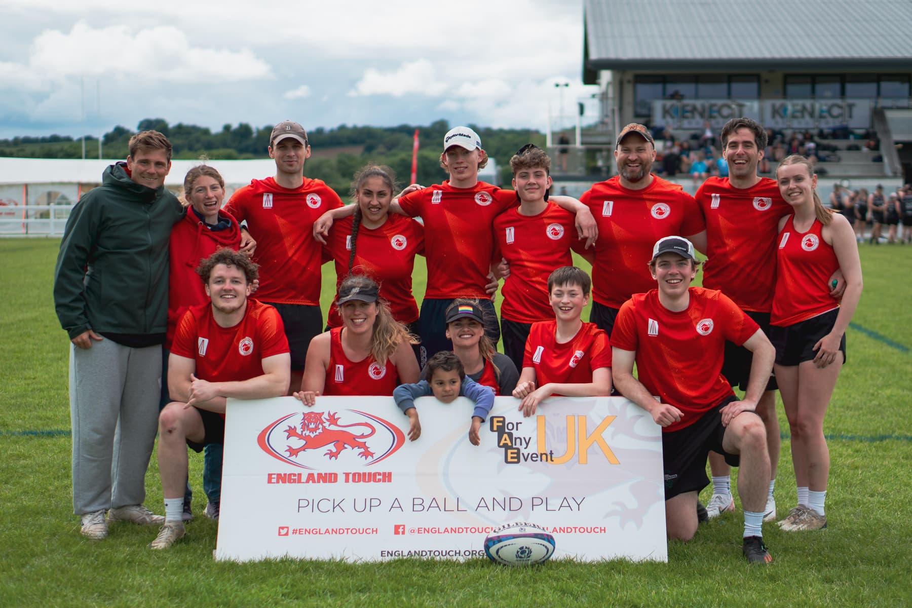 Manchester Foxes mixed squad of men and women in club shirts together at an England Touch event